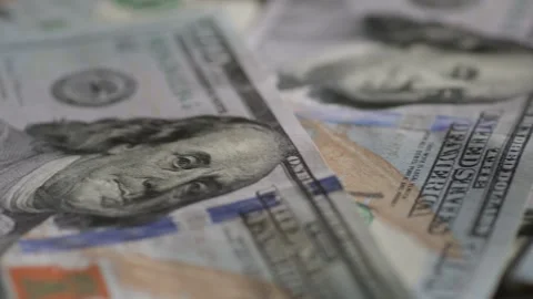 Close up. Panorama of hundred dollar banknotes. Portrait of President Franklin. Stock Footage 260236082