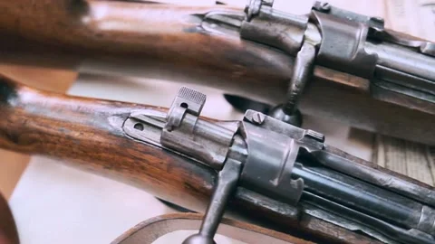 Close-up panorama of vintage rifles Stock Footage 201290487