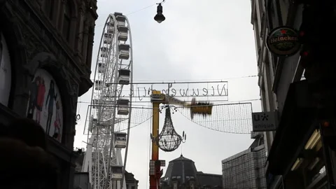 Close up of panoramic wheel in amsterdam view between buildings Stock Footage 139313484