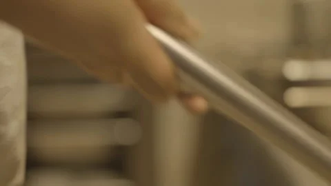 Close-up of pans being stirred Stockbeeldmateriaal 336173928