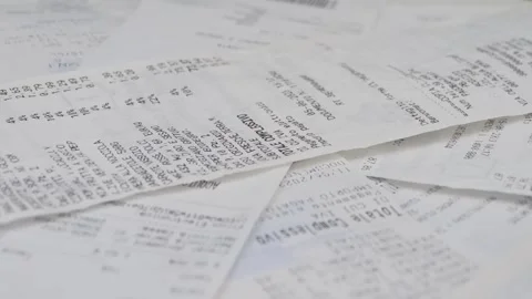 Close-up of a paper check spinning on a turntable Video stock 251584537