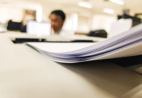 Close-up Paper document on printer,office background. Stock Photos