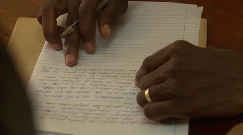 CLOSE UP ON PAPER - TILT TO HEADMASTER'S FACE Stock Footage 60116139