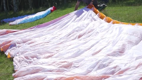 Close-Up of Paraglider Canopy Being Positioned Stock Footage 304567452