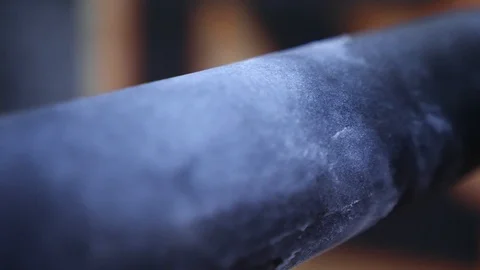 Close up of parallel bar covered with magnesium powder in gym Stock Footage 101395392