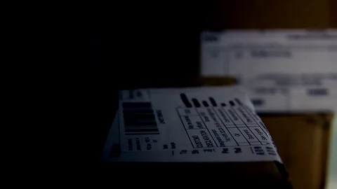 Close Up Of Parcel Package In The Dark. Stock Footage 97868671