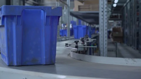 Close up parcels in blue box on conveyor 스톡 동영상 115265949