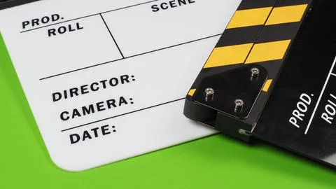 Close up a part of 2 clapper boards or movie slate on green screen background Stock Photos