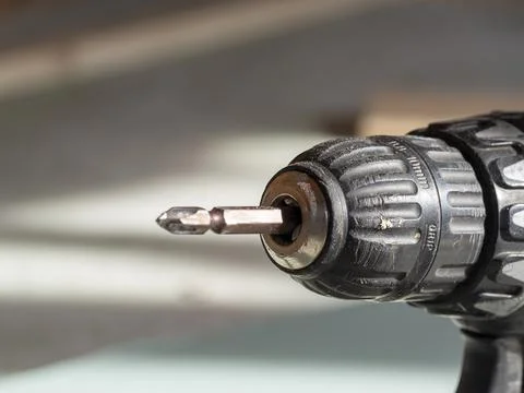 Close-up of part of an electric screwdriver. Construction tools Stock Photos