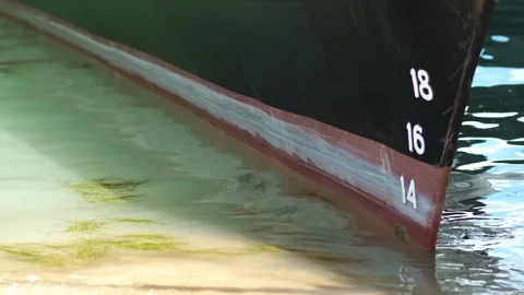 Close up of part of moored passenger ship. bow of ship with rope near shore with Stock Footage 280229851