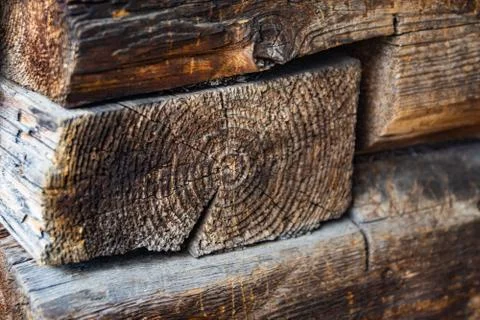 Close-up of part of an old wall of logs. Stock Photos