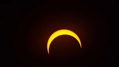 Close up of partial solar eclipse. Some are seeing eclipse as end of the worl Stock Footage 122129662