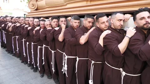 Close Up of Paso Carriers Walking During Holy Week in Malaga Stock Footage 335942556