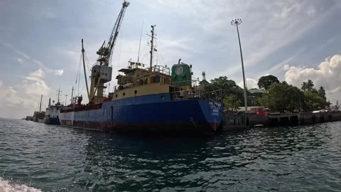 Close Pass of Cargo Ship at Dock, Port Blair, Andaman Islands Stock Footage 339371669