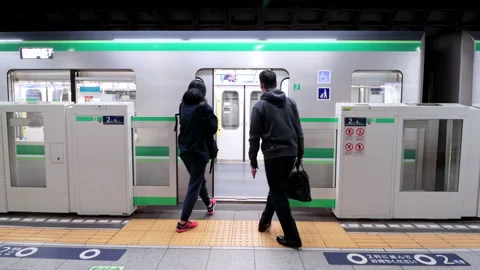 Close up of passenger board the train on Tokyo Metro Chiyoda Line Stock-Footage 189491291