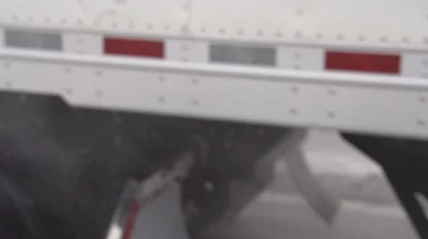 Close Up Passing Semi in Icey Road Conditions Slow Motion 240FPS Stock Footage 54763661