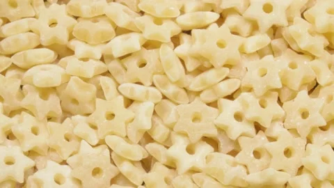 Close-up pasta. Lots of asterisks. Macro video. Видео 140997717