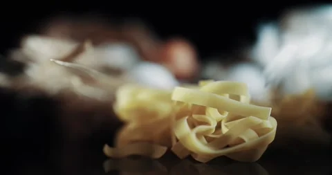 A close up of pasta noodles on a table Stock Footage 344907297