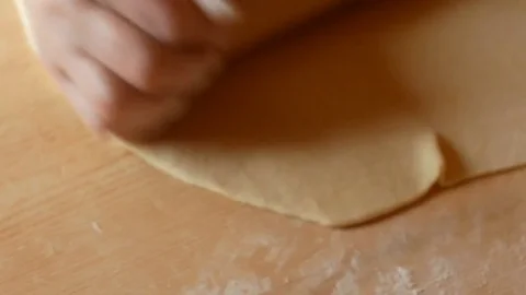 Close up on pasta that is rolled out with a rolling pin Video stock 84196461