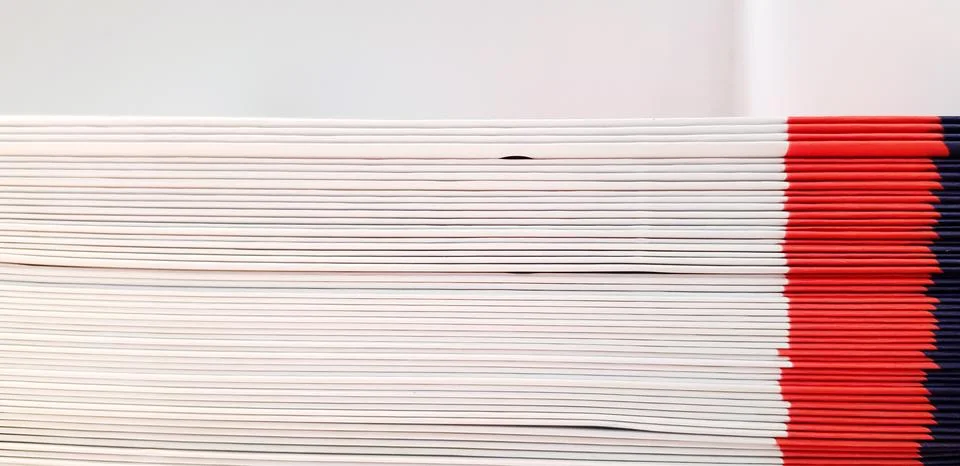 Close up pattern and line of white, red and blue spine or saddle book sorted Stock Photos