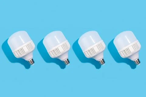 Close up pattern of big led lamps on an isolated blue background. Energy effi Foto stock