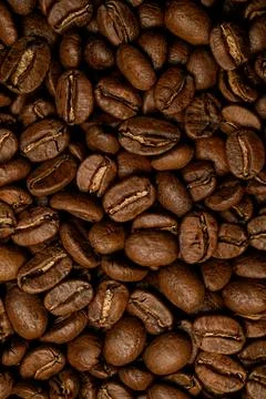 Close-up pattern of brown roasted coffee beans. Can use for background Stock Photos