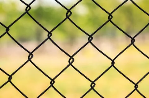 Close up on a pattern of chain link fence Stock Photos
