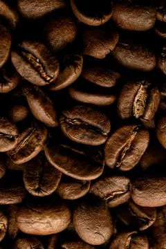 Close-up pattern of dark roasted coffee beans. Can use for background Stock-Fotos
