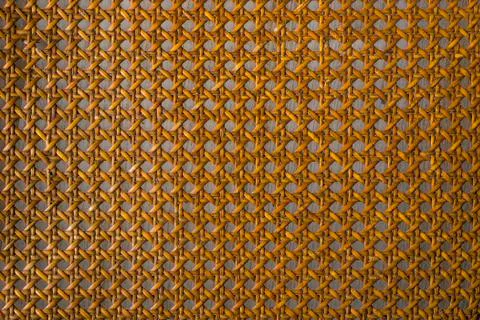 Close up of the pattern formed by open weave rattan cane Stock Photos