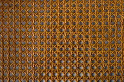 Close up of the pattern formed by open weave rattan cane Foto stock