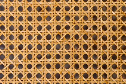 Close up of the pattern formed by open weave rattan cane Foto stock