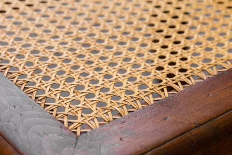 Close up of the pattern formed by open weave rattan cane Stock Photos