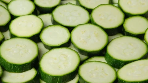 Close-up Pattern of Organic Green Zucchini Slices Stock Footage 333694352