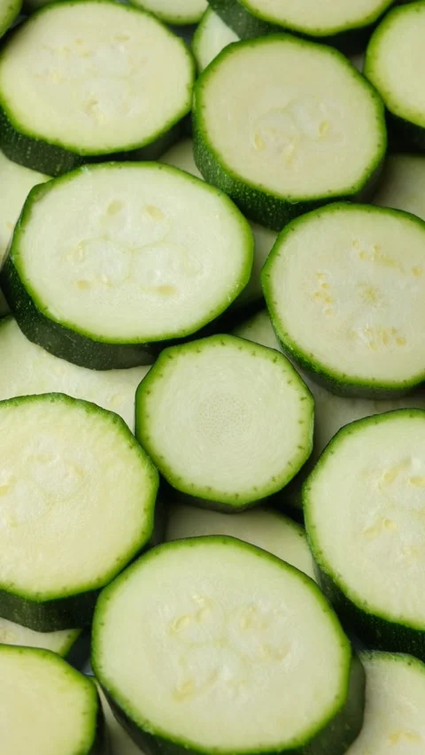 Close-up Pattern of Organic Green Zucchini Slices. Stock Footage 335230830