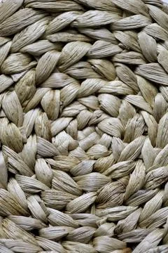 Close-up pattern of round woven placemat made from natural water hyacinth Stock Photos