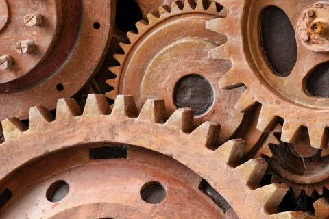 Close up pattern of sculpture using old rusted gears Stock Photos