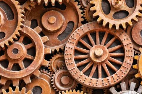 Close up pattern of sculpture using old rusted gears Stock Photos