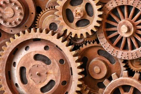 Close up pattern of sculpture using old rusted gears Stock Photos
