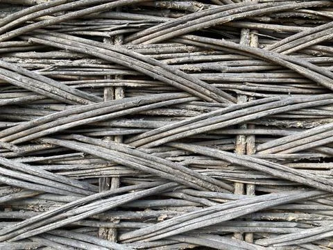 Close-up of patterned fabric with a woven or braided texture, resembling ro.. Stock Photos