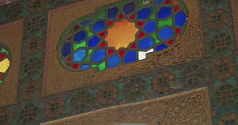 Close-up of patterns and decorative elements of mosaics and windows of the Stock Footage 277873483