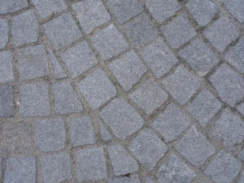 Close-up of pavement texture with rectangular paving slabs with arranged in.. Stock Photos