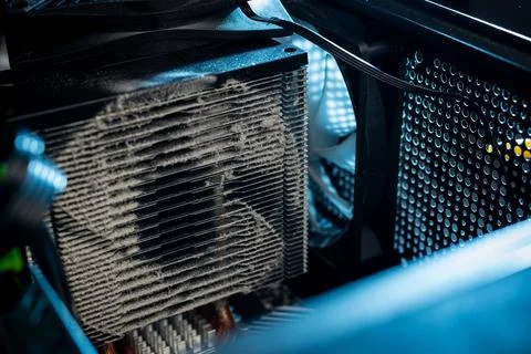 Close-up of a PC cooling system, a dirty radiator from a computer Stock Photos