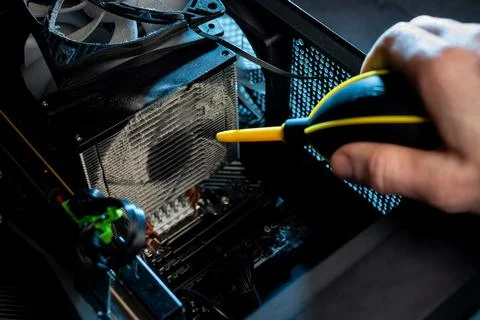 Close-up of a PC cooling system, a dirty radiator from a computer Stock Photos