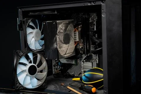 Close-up of a PC cooling system, a dirty radiator from a computer Stock Photos