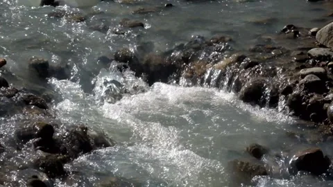 Close up of a peaceful flowing cascade Video stock 336830215