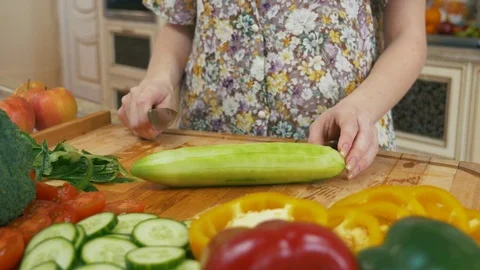 Close Up pealing cucumber Stock Footage 78489587