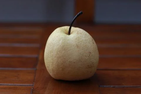 A close up of pear isolated natural pattern wood background. healthy food c.. Stock Photos