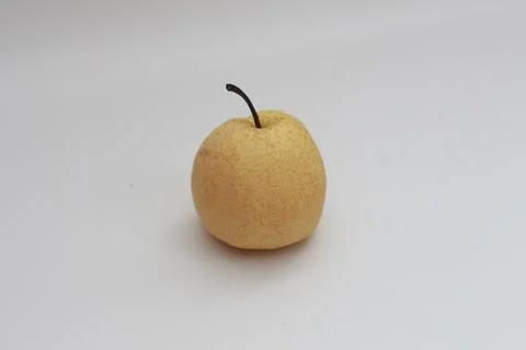 A close up of a pear isolated on a white background. healthy food concept p.. Stock Photos
