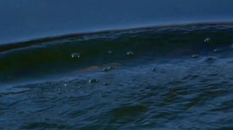Close Up: Pebble Splashes into Pond Stock Footage 32701642