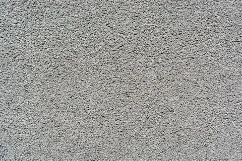 Close up pebbles texture on the wall Stock Photos